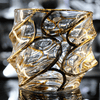 Japanese crystal whisky glass with gold line swirl detail, faceted look