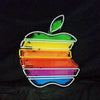 Neon apple logo sign with white outline, green leaf, and red-to-blue strips