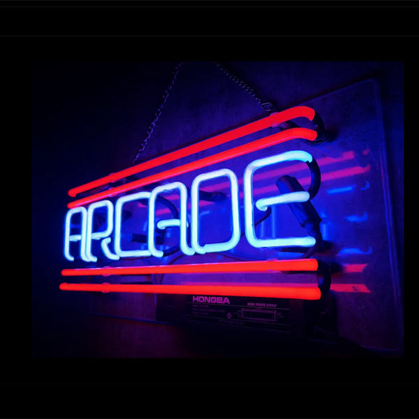 Neon arcade sign with 'ARCADE' lettering, red outer and blue interior tubes