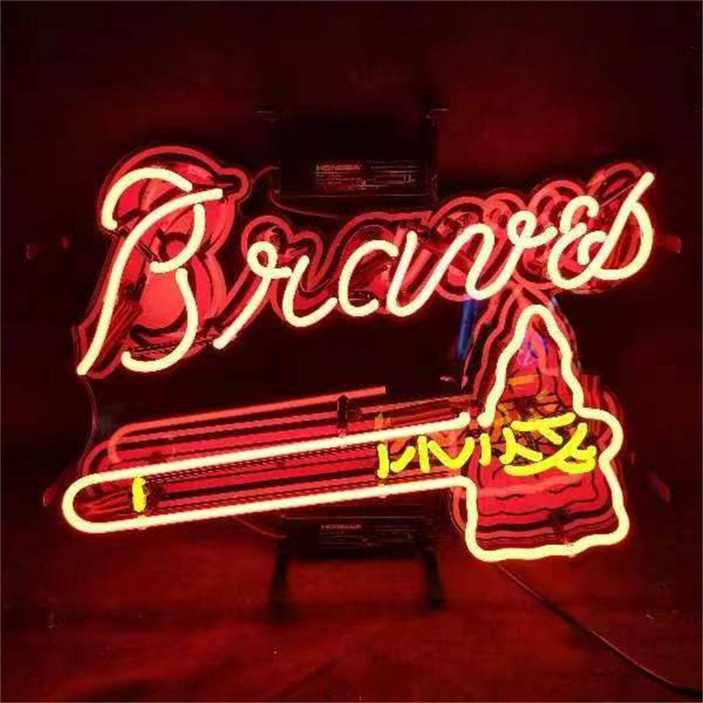 Neon Braves sign with Braves script and tomahawk figure beside baseball bat, red glow