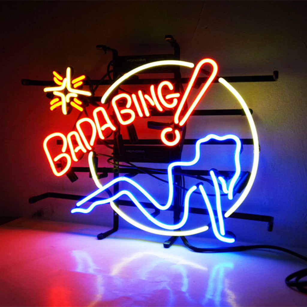 Neon girl sign with Bada Bing text and cocktail glass, red, yellow, blue, white light