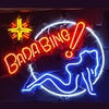 Neon Bada Bing sign with cocktail glass and blue legs, red, yellow, white, blue light