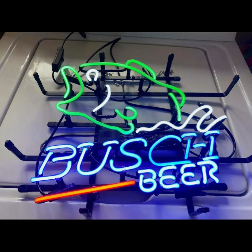 Neon beer sign light with blue 'BUSCH' lettering, green fish outline and red accent