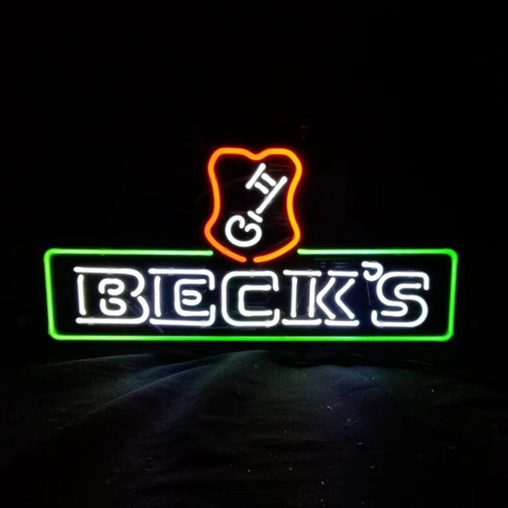 Neon beer sign with green border, orange icon, and BECK'S lettering in white