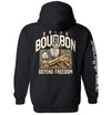 Black hoodie with back graphic: bourbon bottle, DRINK/BOURBON text, DEFEND FREEDOM