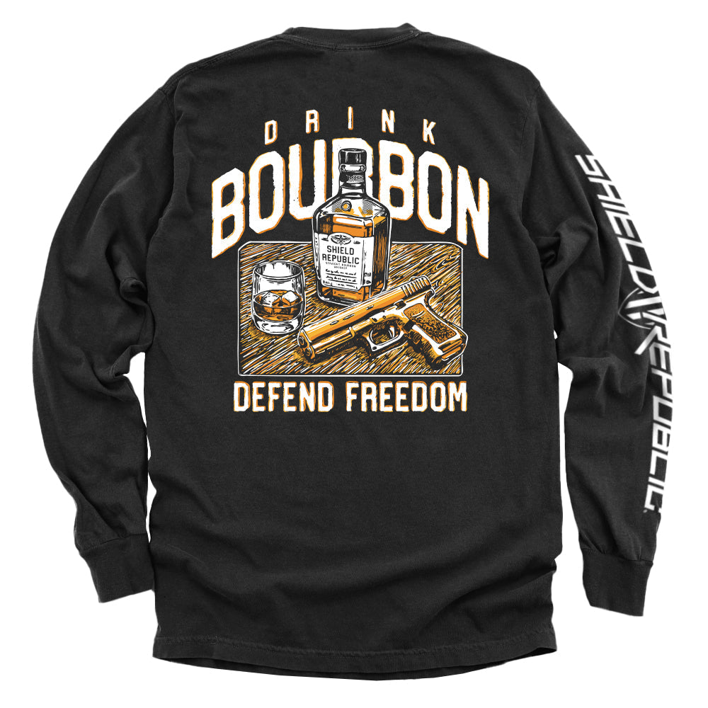 Black long-sleeve shirt with back graphic: bourbon bottle, DRINK/BOURBON text, DEFEND FREEDOM