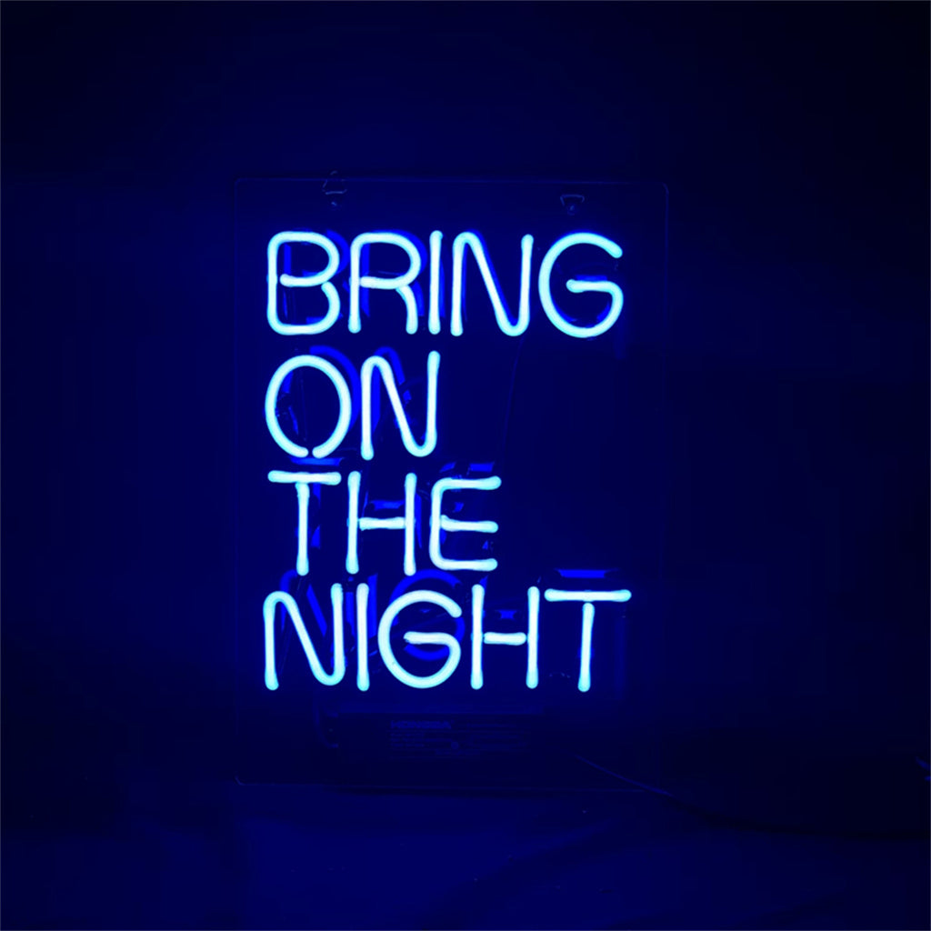 Neon sign light reading “BRING ON THE NIGHT” in blue lettering