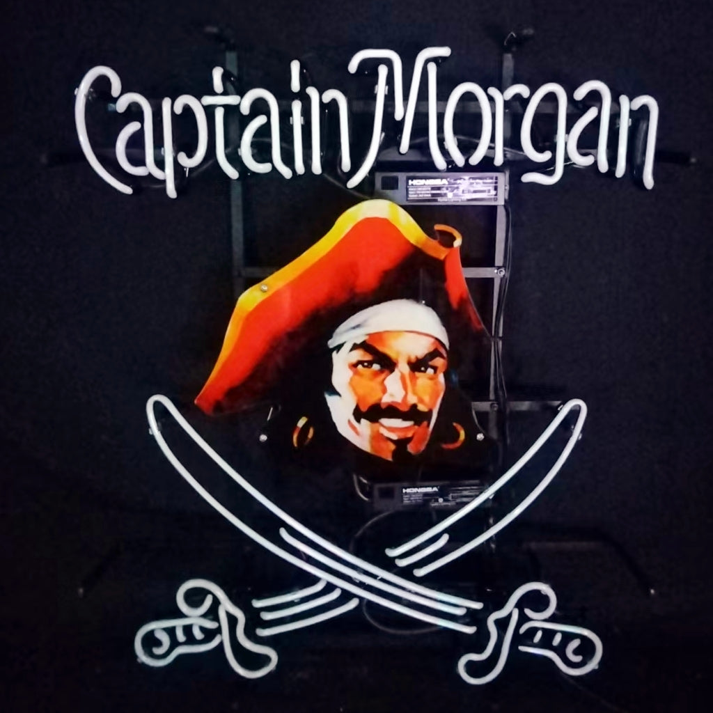 Captain Morgan neon sign with white lettering, pirate portrait, and saber-shaped light