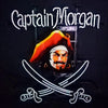 Captain Morgan neon sign with white lettering, pirate portrait, and saber-shaped light