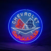 Round Chevrolet Corvette neon sign with blue ring and checkered helmet graphic