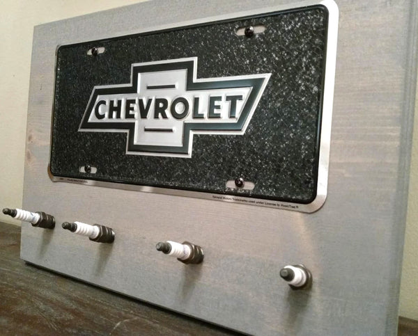 Chevy - Black License Plate Spark Plug Rack
