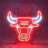 Neon bull head wall sign with glowing red and blue outline horns