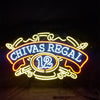 Chivas Regal 12 neon whiskey sign with yellow, red, and blue light logo