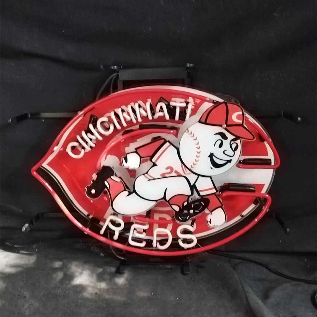 Cincinnati Reds neon sign with bat-and-baseball character, red glow and white lettering