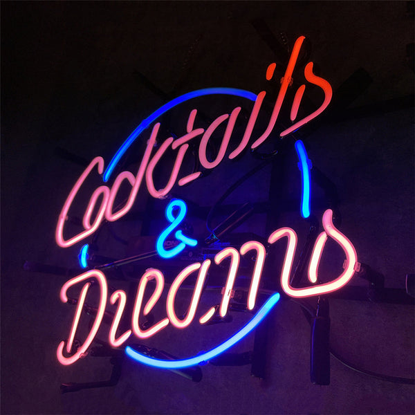 Neon cocktail and dreams sign in blue and red glowing script with dark pink accents