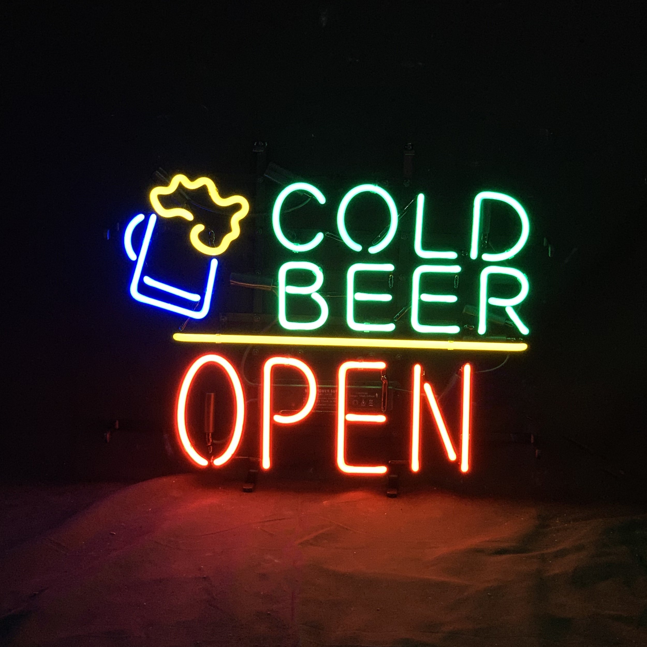 Neon beer sign reading COLD BEER and OPEN with beer mug icon
