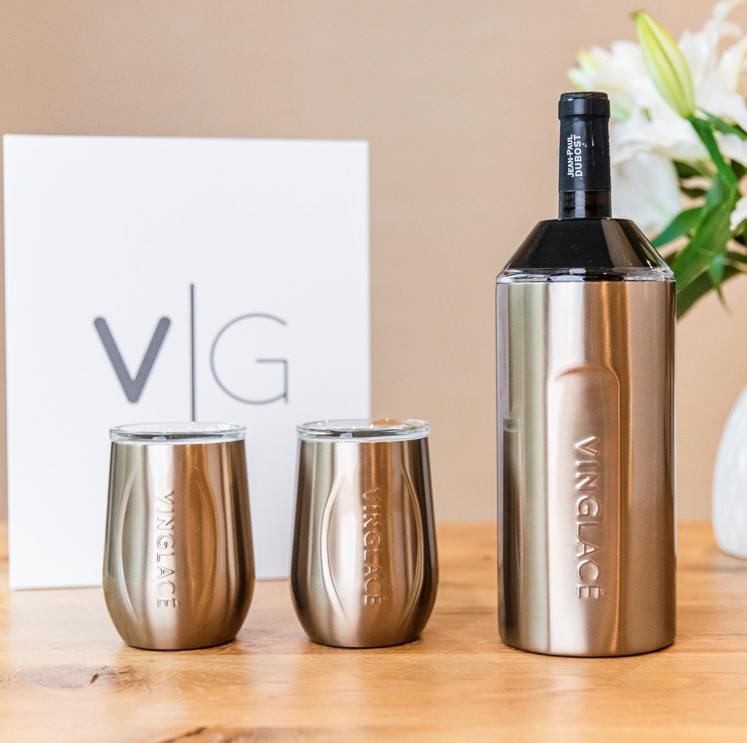 Brushed bronze wine bottle cooler with two matching tumblers