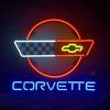 Corvette neon sign showing checkered panel and car icon, orange ring, blue 'CORVETTE'