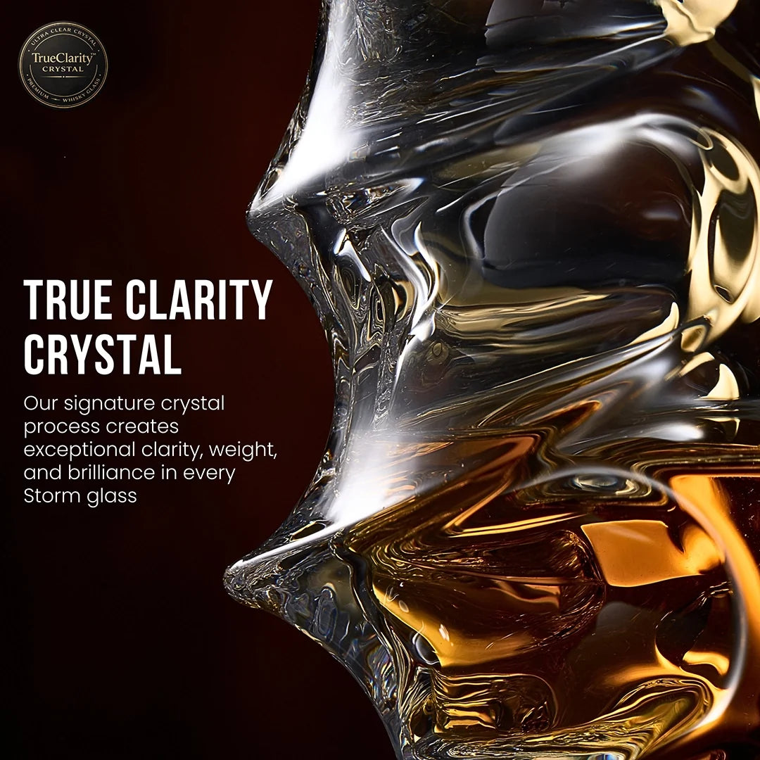 Faceted crystal whisky glass close-up with amber highlights