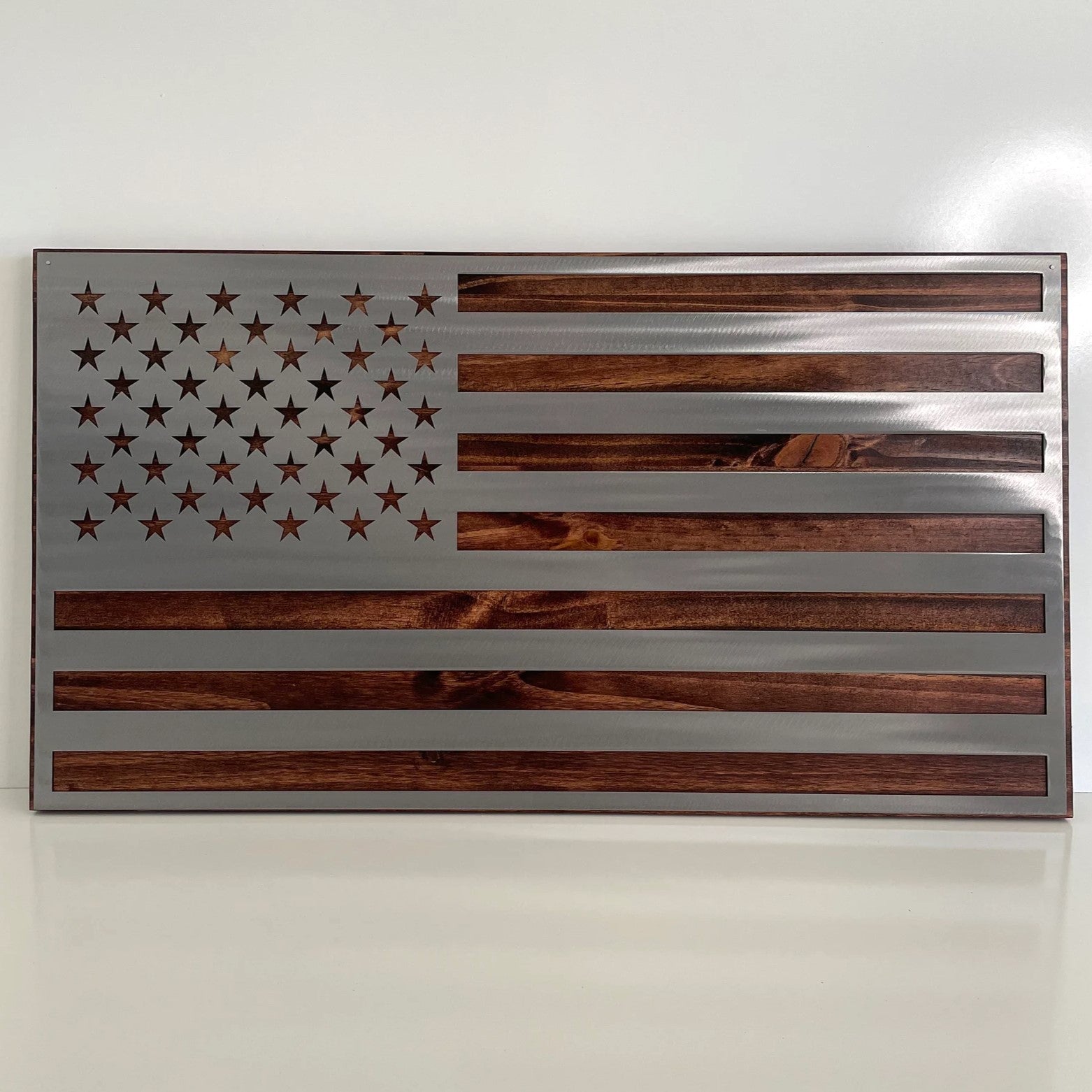 Metal American Flag on Dark Wood