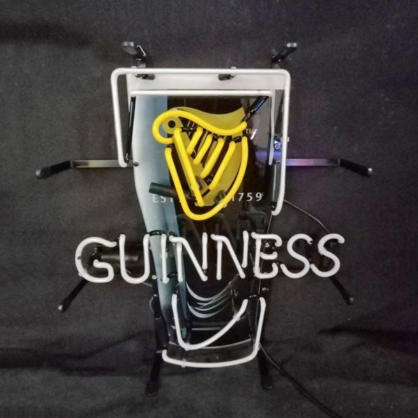 Guinness neon beer can sign angled view, yellow harp and white GUINNESS letters