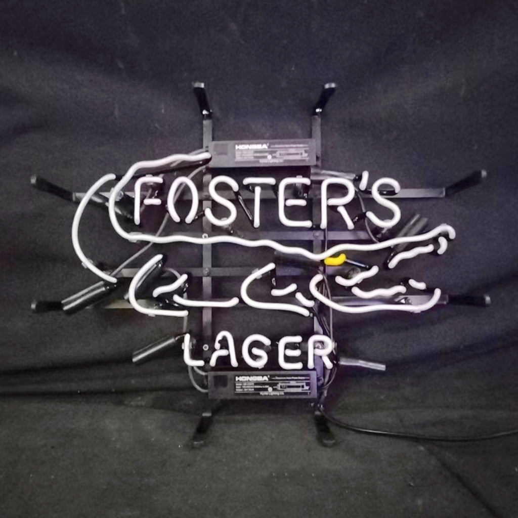 White neon gator beer sign with Foster's and Lager lettering