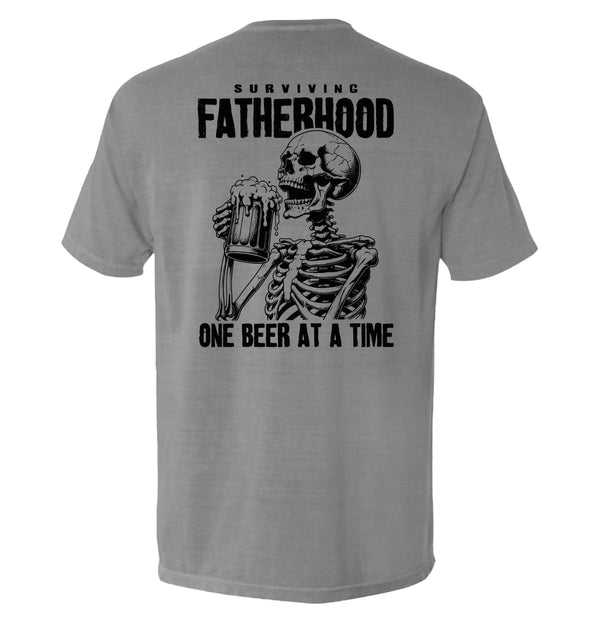 Grey T-shirt with skeleton holding beer and 'Surviving Fatherhood' back graphic