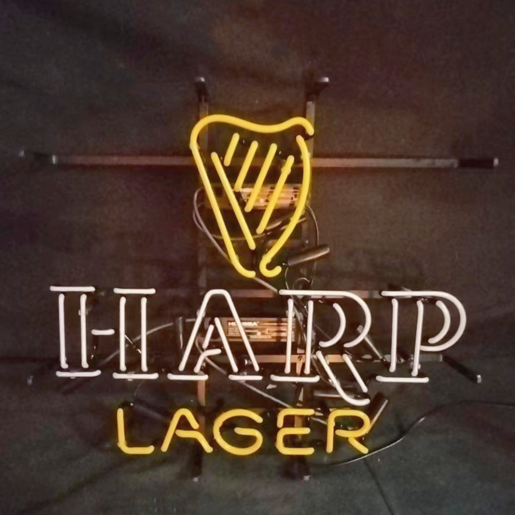 Harp Lager beer neon sign with yellow harp icon and 'HARP'/'LAGER' lettering