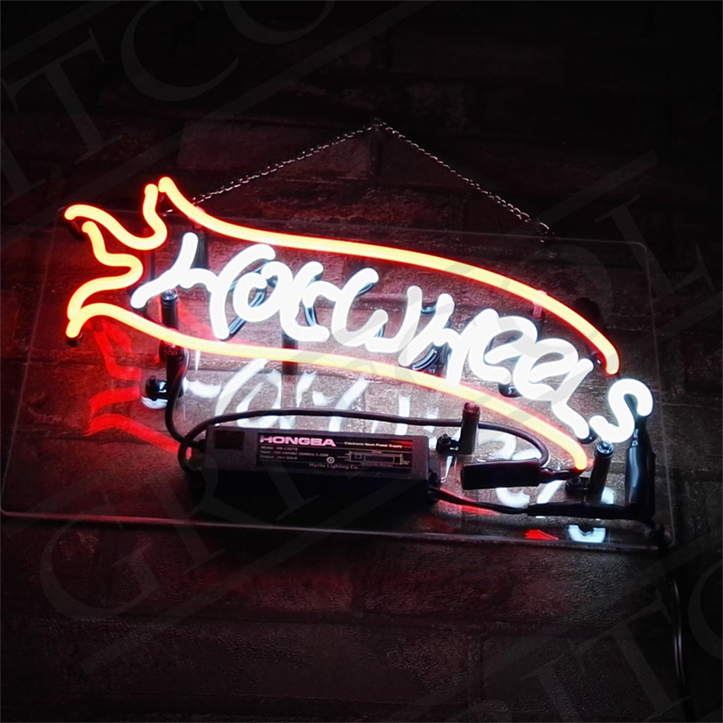 Hot Wheels neon sign with yellow border and white script text, black power box visible