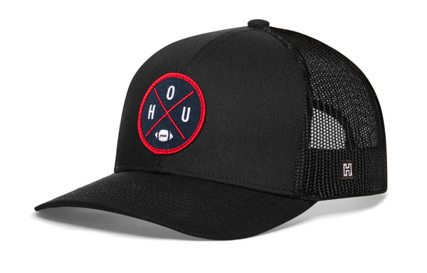 Black trucker hat with mesh side panels, curved brim, snapback strap, round HOUX logo