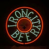 Circular neon beer sign with Steelers logo and ONC letters, orange and green glow