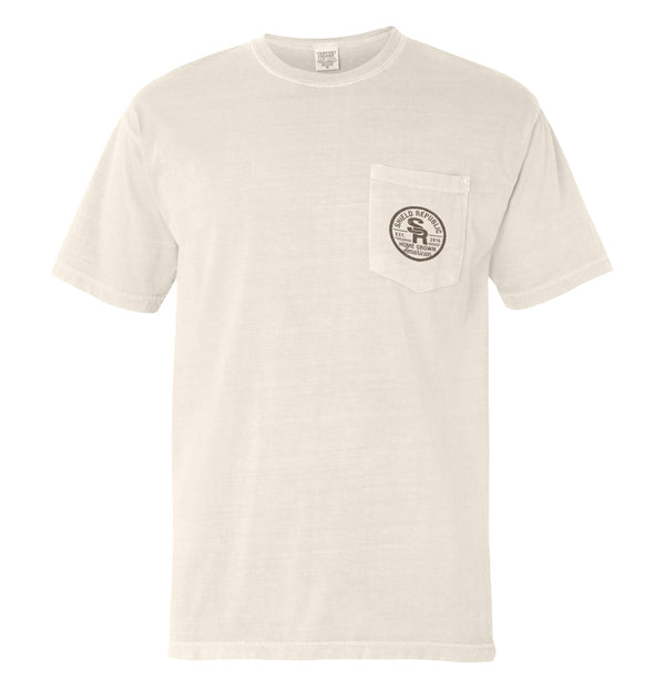 Ivory pocket T-shirt with small round logo patch on left chest