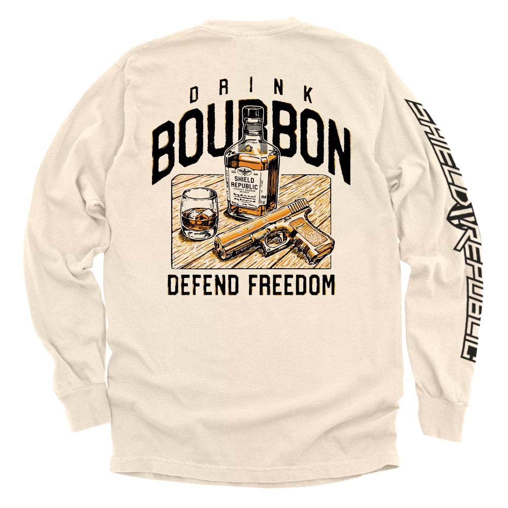 Ivory long-sleeve shirt with back Drink Bourbon graphic, whiskey bottle and DEFEND FREEDOM