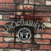Jack Daniel's Old No.7 neon sign on metal frame, red boot and white 'Jack Daniel's' text