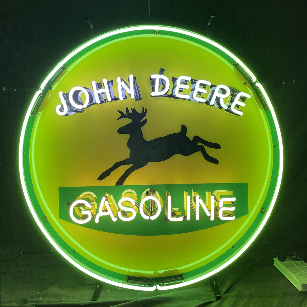 John Deere Gasoline neon sign with horse silhouette, green ring and yellow center.