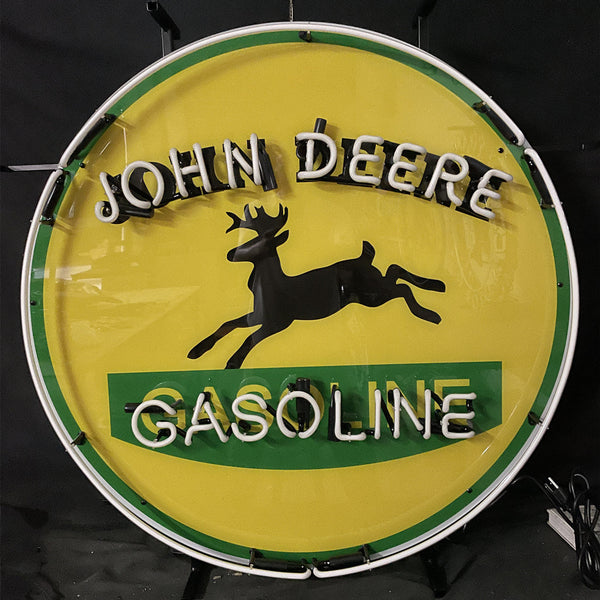 John Deere Gasoline neon sign, circular green light ring with horse silhouette and text.