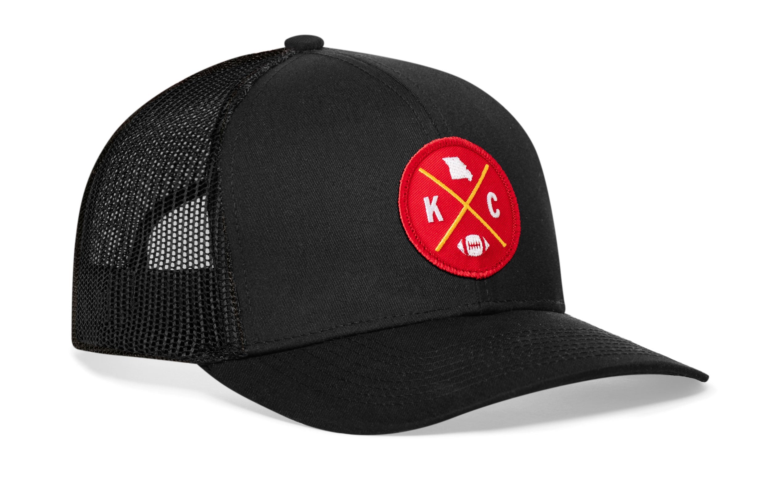 Black trucker cap with red round logo patch and black mesh rear panels