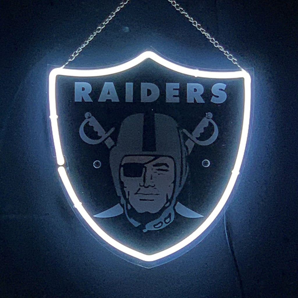 Neon Raiders shield acrylic sign with chain, glowing white border and Raiders text