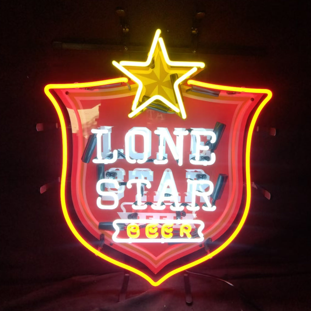 Neon beer sign with yellow star, 'LONE STAR' text on red shield, 'BEER' label