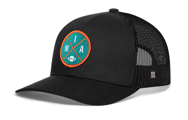 Black trucker cap with mesh back, curved brim, circular MIA patch on front