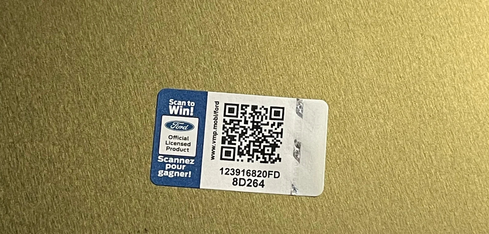 Clock barcode label with QR code and serial number sticker on beige backing