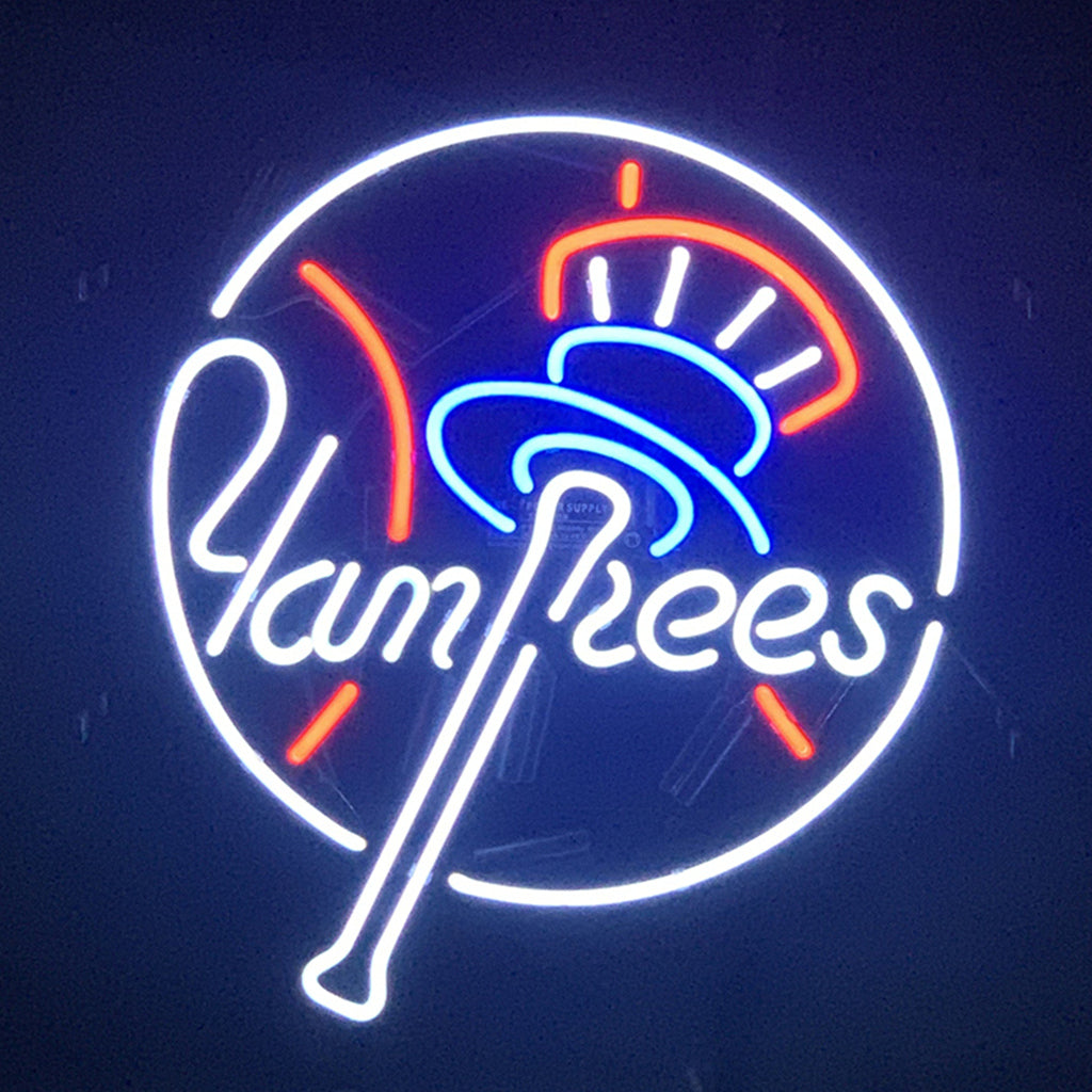 Neon baseball sign, circular Yankees design with bat and club logo.