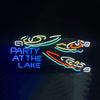 Neon yacht party sign with “PARTY AT THE LAKE” lettering and red accents