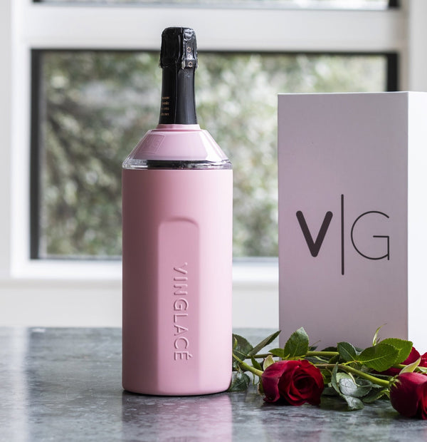 Pink VINGLACE insulated wine cooler with bottle, rose gift box, and flowers