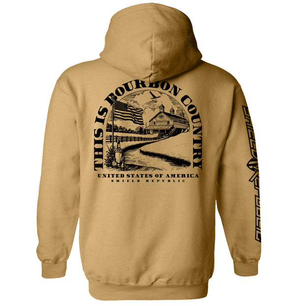 Tan pullover hoodie with large back graphic and vertical side text
