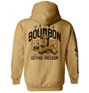 Tan pullover hoodie with back Drink Bourbon graphic, whiskey bottle and DEFEND FREEDOM