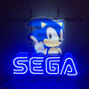 Blue character neon sign with outline 'SEGA' light lettering