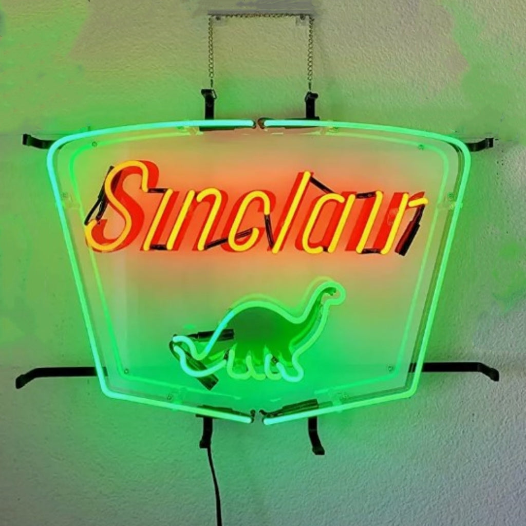 Neon gas station sign light with Sinclair lettering and dinosaur graphic
