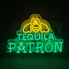 Front view neon acrylic sign 'TEQUILA PATRON' with Patron face logo, yellow and green.