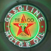 Gasoline oil neon sign with Texaco star center and green neon outer ring
